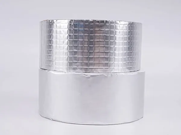 A roll of smooth aluminum foil butyl tape and a roll of checkered aluminum foil butyl tape.