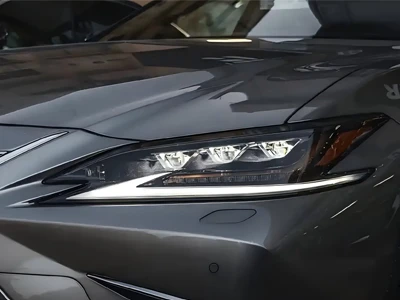 A headlight being sealed with butyl windshield sealant