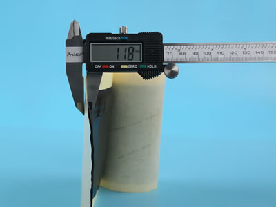 Use the calipers to measure the thickness of wide double sided butyl sealing tape, and the number is 1.18 mm.