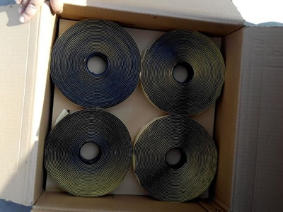 Four rolls of double sided butyl tapes are put in a carton box for package.
