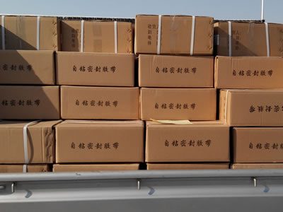 Many carton boxes with double sided butyl tapes inside are put on the truck for transport.