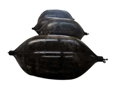 4 black shapes resembling cocoons high pressure pipeline blocking airbag