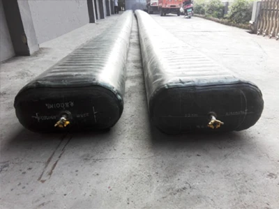 2 oval-shaped rubber inflated culvert balloons placed on the ground