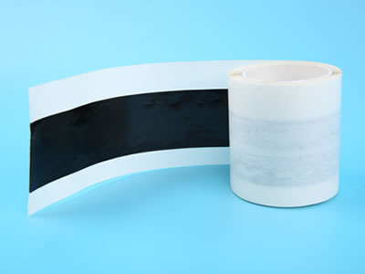 A roll of wide butyl sealant tape with some unfolded part that is lying on the blue background.